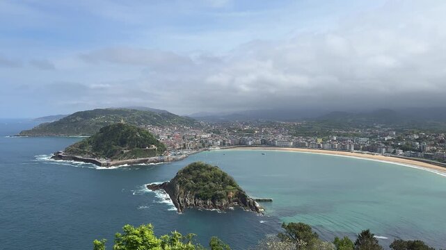 San Sebastian La Concha Bay Santa Clara Island Full Panorama Dramatic Sky 4K 60fps