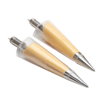 Two disposable pastry bags with metal tips isolated [Transparent Background PNG].