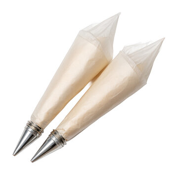 Two disposable pastry bags with metal tips isolated [Transparent Background PNG].