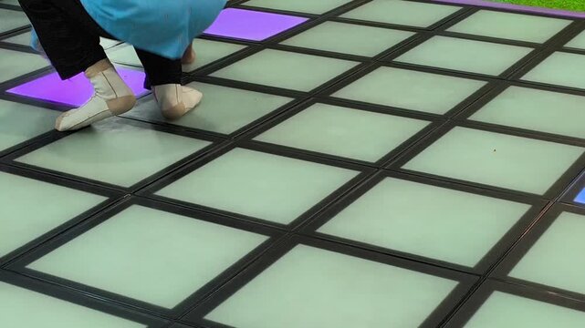 Interactive LED floor lights featuring vibrant illuminated panels that respond to movement, creating an immersive atmosphere for game rooms, dance venues, entertainment centers, and modern interactive