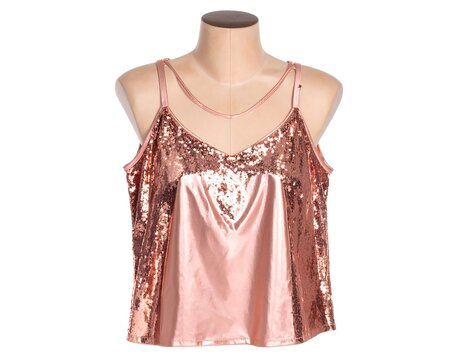 A rose-gold sleeveless top with sequined details on a mannequin