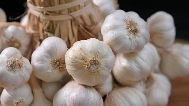 Dried garlic used as a cooking ingredient. Aromatic and flavorful garlic suitable for seasoning, food preparation, and culinary applications. Ideal for healthy food, spices, and kitchen concepts.
