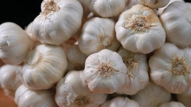 Dried garlic used as a cooking ingredient. Aromatic and flavorful garlic suitable for seasoning, food preparation, and culinary applications. Ideal for healthy food, spices, and kitchen concepts.