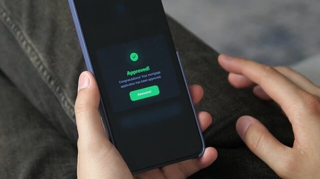 Borrower receives mortgage approval on a mobile screen, showing how fintech is changing property finance through rapid verification and digital access.