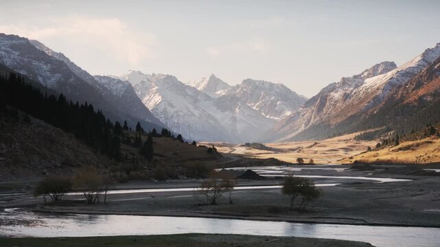 Autumn mountain landscape with river and golden wilderness on sunny day at Sary Jaz Valley