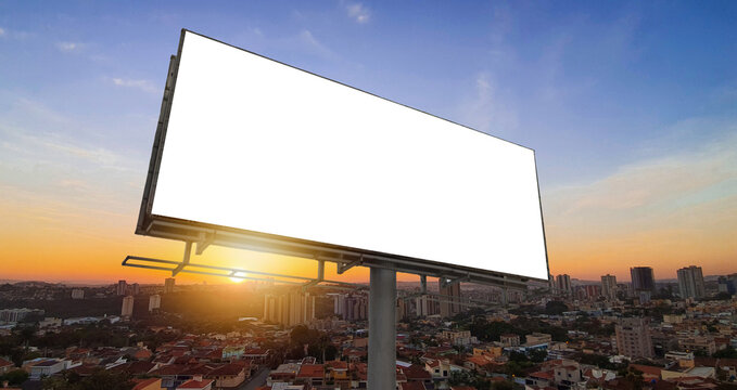 Blank White Billboard Mockup on Modern City Skyline Background Sunset