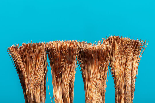 Power copper electrical wire on a blue background.