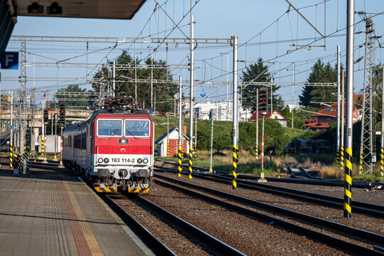 Poprad, Slovakia - July 25, 2026: Passenger train arriving at Poprad-Tatry railway station platform.