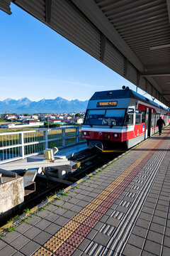 Poprad, Slovakia - July 25, 2026: Tatra Electric Railway train bound for Strbske Pleso at Poprad-Tatry station.