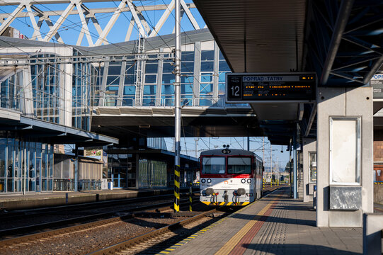 Poprad, Slovakia - July 25, 2026: Train arriving at Poprad-Tatry railway station platform.