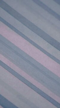 Vertical Panning Shot Of Abstract Blue Diagonal Stripe Pattern Background