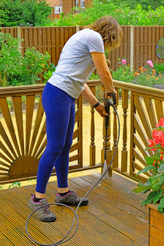 Power washing the outside decking.