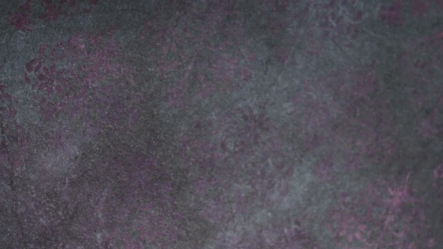 Macro Shot of Moody Vintage Purple Damask Pattern on Dark Surface