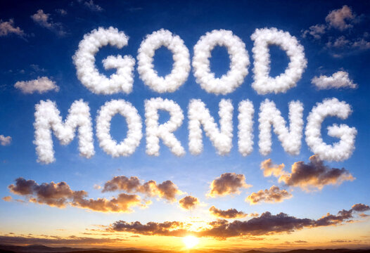 Beautiful sunrise with clouds forming good morning text in the sky perfect for inspiration