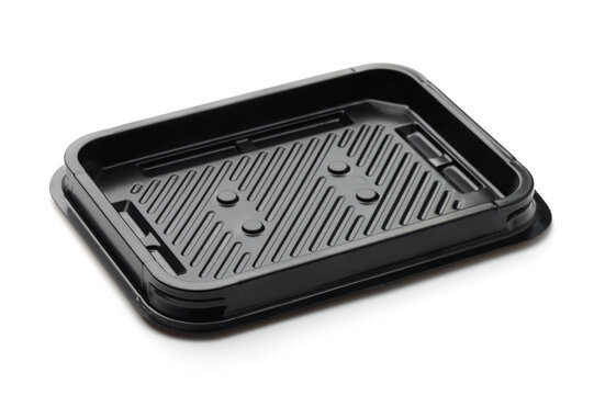 Empty black plastic disposable packaging food tray