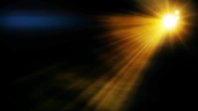 Warm golden light ray beaming down diagonally through atmospheric volumetric fog and haze over a pitch black background.