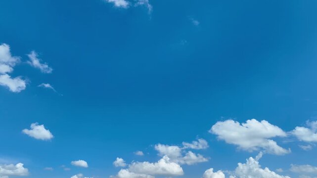 Wide aerial panorama capturing a clear blue sky landscape, symbolizing freedom, unlimited opportunities, solar and wind energy potential, and a hopeful transition toward a cleaner low carbon future.
