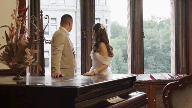 A couple in love, a man and a woman, hug and kiss.