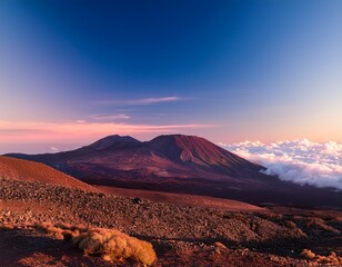 Naklejka premium distant mauna kea summit disappears into soft pink clouds sky volcano peaceful