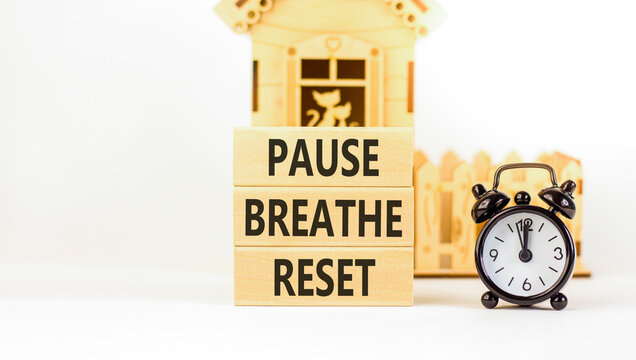 Pause breathe reset words symbol. Concept words Pause breathe reset on beautiful wooden blocks. Beautiful white background. Business support motivational and pause breathe reset concept. Copy space.