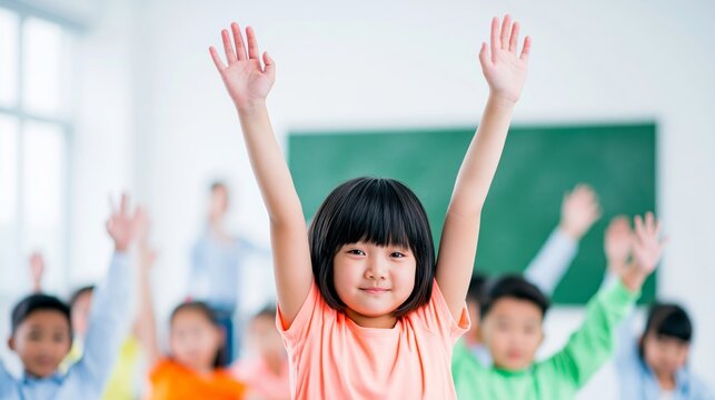Happy elementary school students raising hands in a vibrant learning environment, eager to answer questions during class