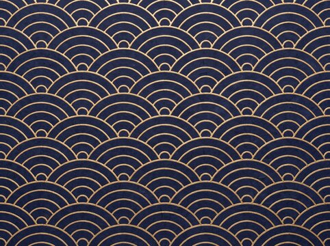 An intricate Japanese Seigaiha wave pattern with thin metallic gold lines on a dark navy blue textured paper background, elegant seamless vector style.