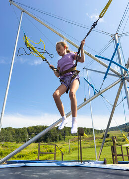 Lifestyle girl jump bungee trampoline   