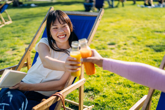 A woman spends time with a friend in the park