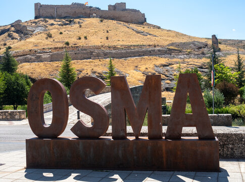Osma sign with medieval castle in El Burgo de Osma, Soria, Spain