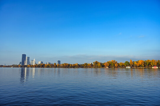 Vienna Skyline And Danube River With Autumn Forest Landscape