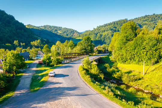 countryside road through carpathian mountains. beautiful summer landscape for ukraine travel background