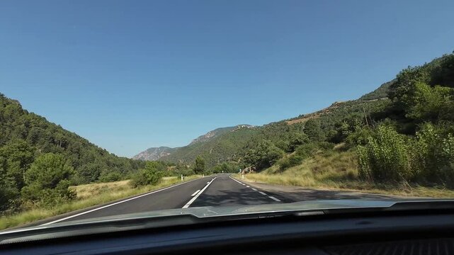 Driving a car on a mountain road in Martinet, Spain