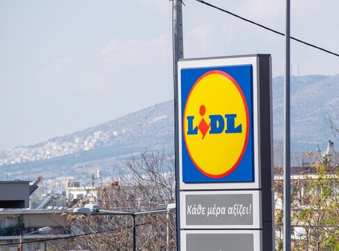 Athens,Greece-November 09,2018.Sign of a Lidl supermarket against a blue sky.