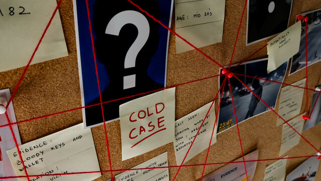 Detective board organizing leads, pictures, and notes with red string, unraveling the mystery behind an ongoing cold case