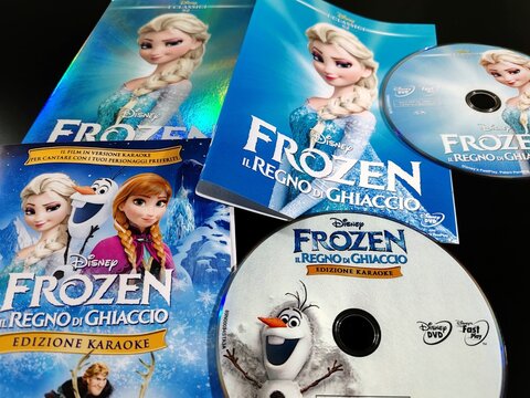 Rome, Italy - October 14, 2025, oblique view on two DVDs, Frozen and Frozen Karaoke Edition.