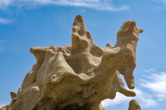 A sandstone formation rising into the sky at Fantasy Canyon Recreation Site near Vernal, Utah, USA