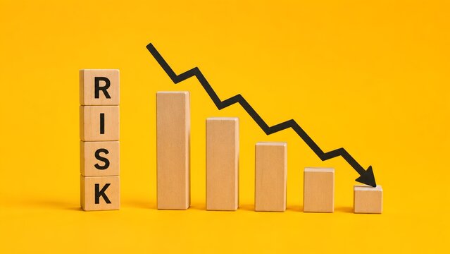 Financial risk reduction strategy concept showing falling black arrow over descending wooden bar chart symbolizing economic crisis mitigation