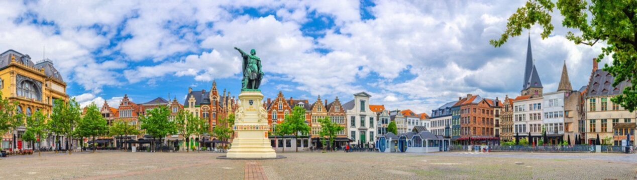Panoramic view of Vrijdagmarkt Friday market square with Jacob van Artevelde statue and old colorful flemish buildings in Ghent historical city centre, Gent old town panorama, Flemish Region, Belgium