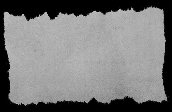 Torn paper on black