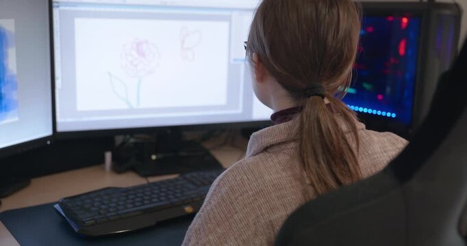 Girl with Glasses Drawing Picture on Desktop Computer Monitor. 4K 10-bit