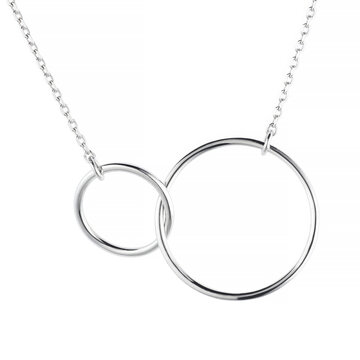 Close-up professional product shot of an elegant silver necklace featuring two interlocking rings. Minimalist jewelry design, perfect for gifts, romance, and fashion.