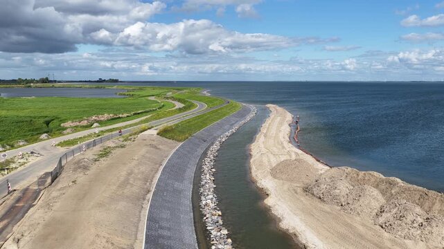 Aerial view of coastal protection dyke and sand nourishment project
