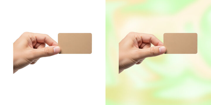 Human hand holding empty rectangular brown card on transparent and light green background.