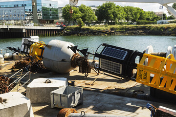 Naklejka premium A maritime navigation buoy used at sea to guide navigation, in mark channels, or signal specific zones. Here, in their storage area in Dunkirk, France