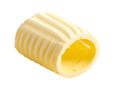 Fresh yellow butter curl isolated on black background studio photograph of a classic dairy product for culinary recipe design