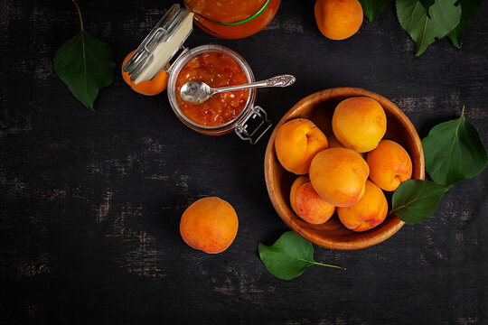 Rustic Still Life with Apricots and Homemade Jam. Top view