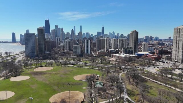 Right to left skyline Chicago Aerial Grant Park Downtown in springtime