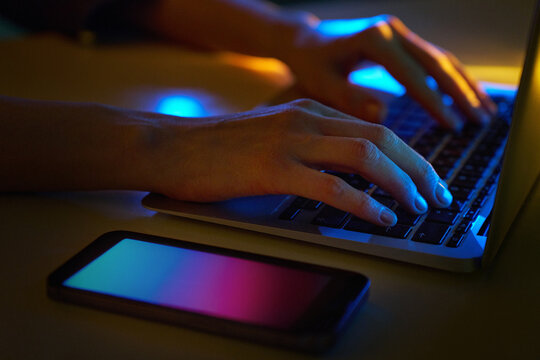 Neon cyberspace work with smartphone and hi-tech laptop