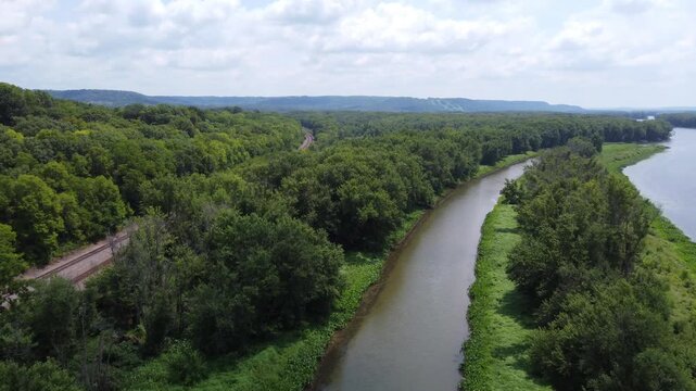 Slow Approach Aerial of Casper Bluff just outside of Galena Illinois in summertime.  Hilly vista overlooking the Mississippi River. 