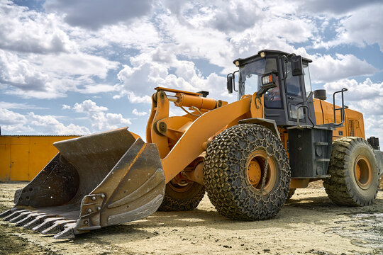 Heavy machinery at an open-pit copper mining site